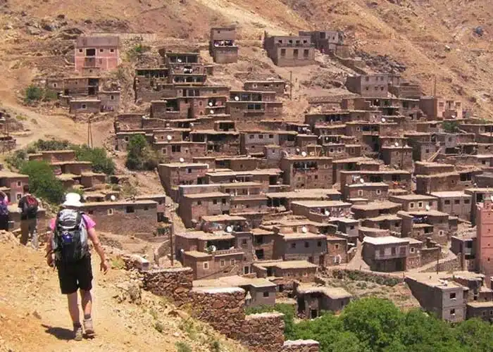 trekking past Berber villages during the 3 day Imlil to Ourika Valley traverse