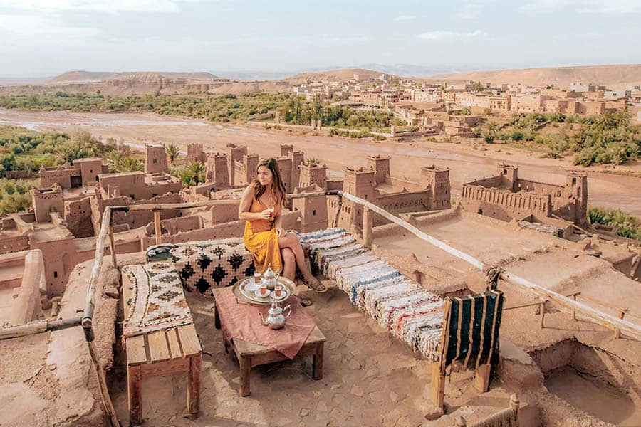 Sipping a cup of Mint tea at a roof top terrace cafe in Kasbah Ait Ben Haddou