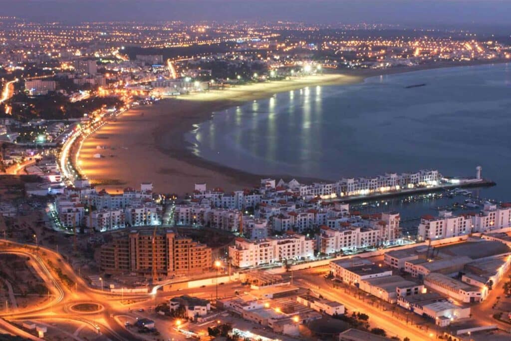 Night view of Agadir’s crescent bay and marina lights