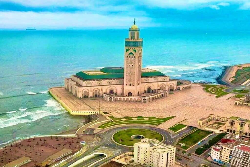 Aerial view of Hassan II Mosque projecting into the Atlantic in Casablanca